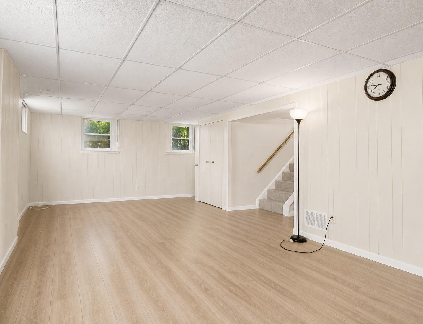 4205 Winterode Way Baltimore, MD 21236 - Photo 25 of 45 AI enhanced w/ cream painted paneling & lvp floors