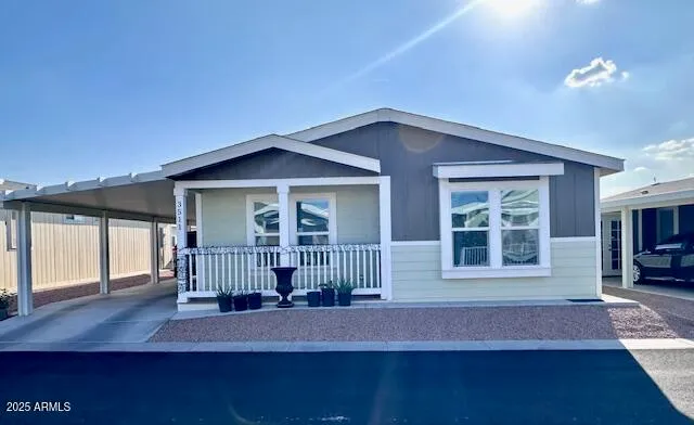 a house view with a garden space