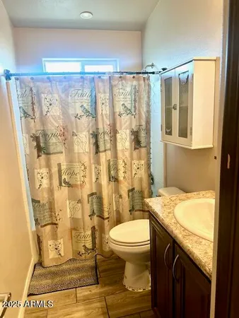 a bed room with furniture and a window