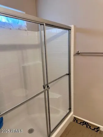 a bedroom with a bed and a closet