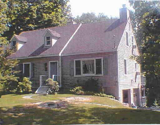 18 Madeline Drive Ridgefield, CT 06877 - Photo 1 of 1 a front view of a house with garden