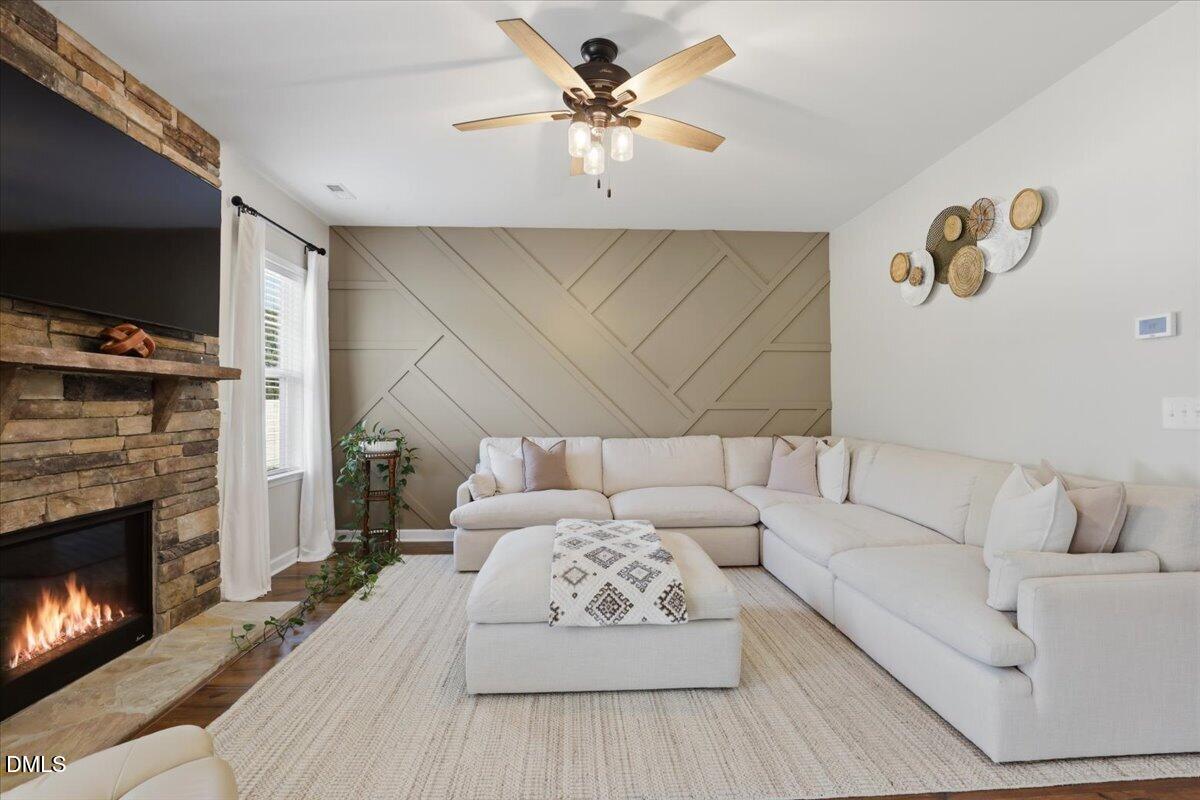 136 Fallingbrook Drive Kenly, NC 27542 - Photo 10 of 54 a living room with furniture and a fireplace
