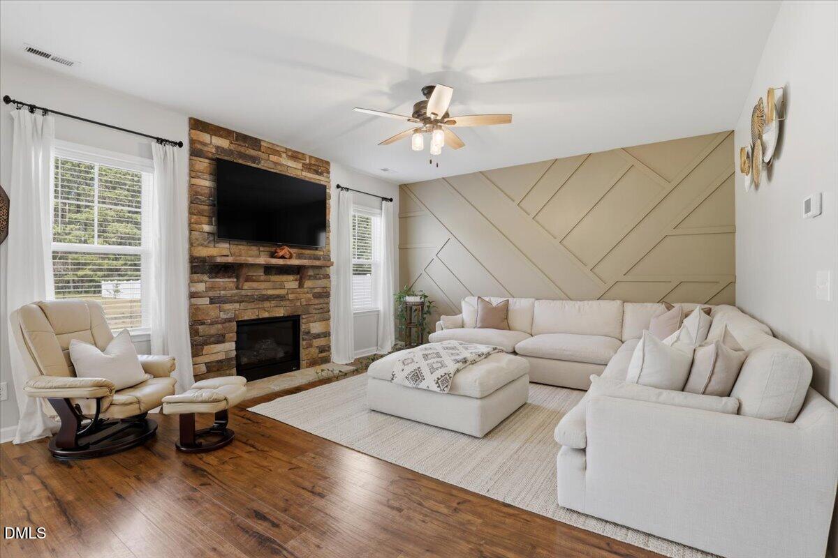 136 Fallingbrook Drive Kenly, NC 27542 - Photo 11 of 54 a living room with furniture fireplace and flat screen tv