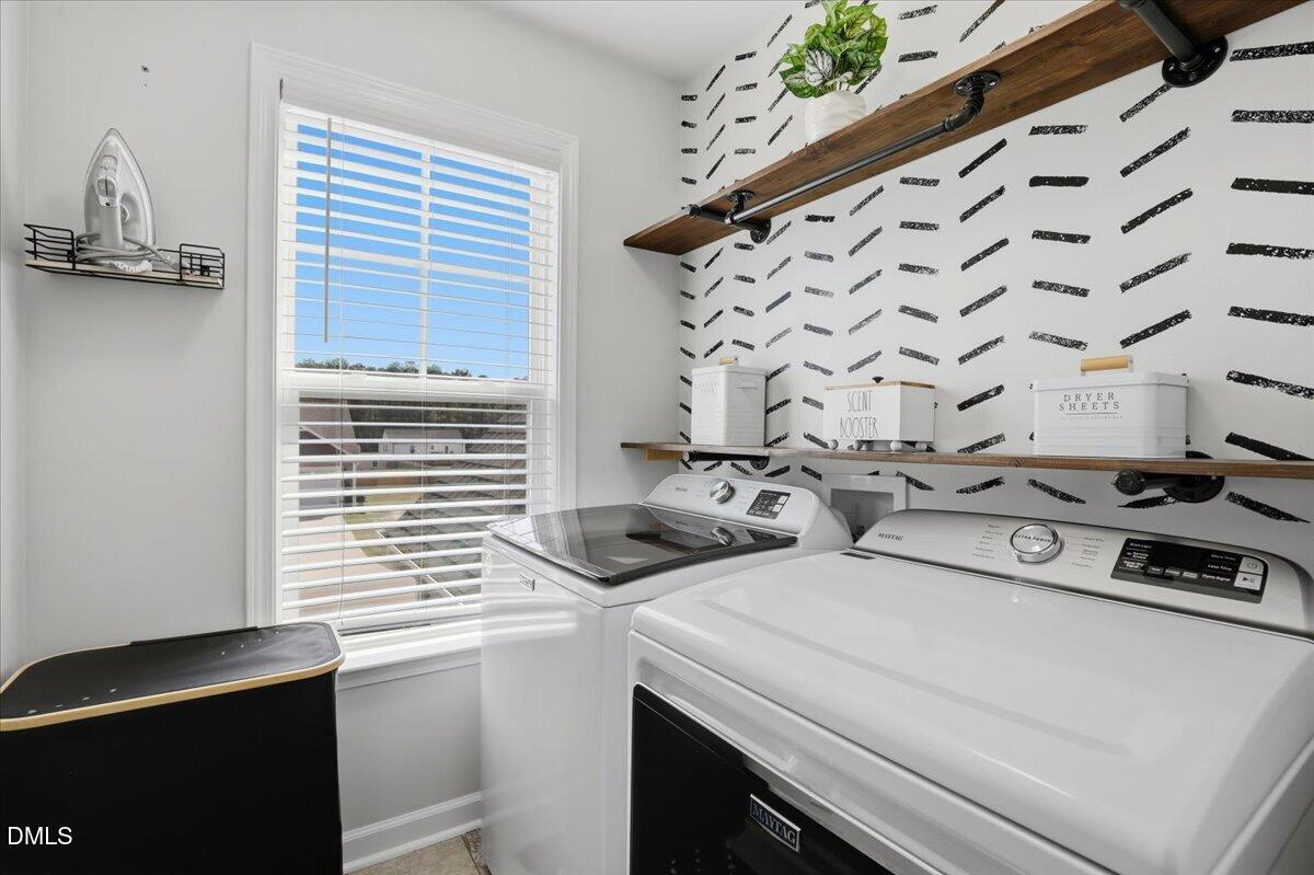 136 Fallingbrook Drive Kenly, NC 27542 - Photo 23 of 54 a utility room with dryer and washer