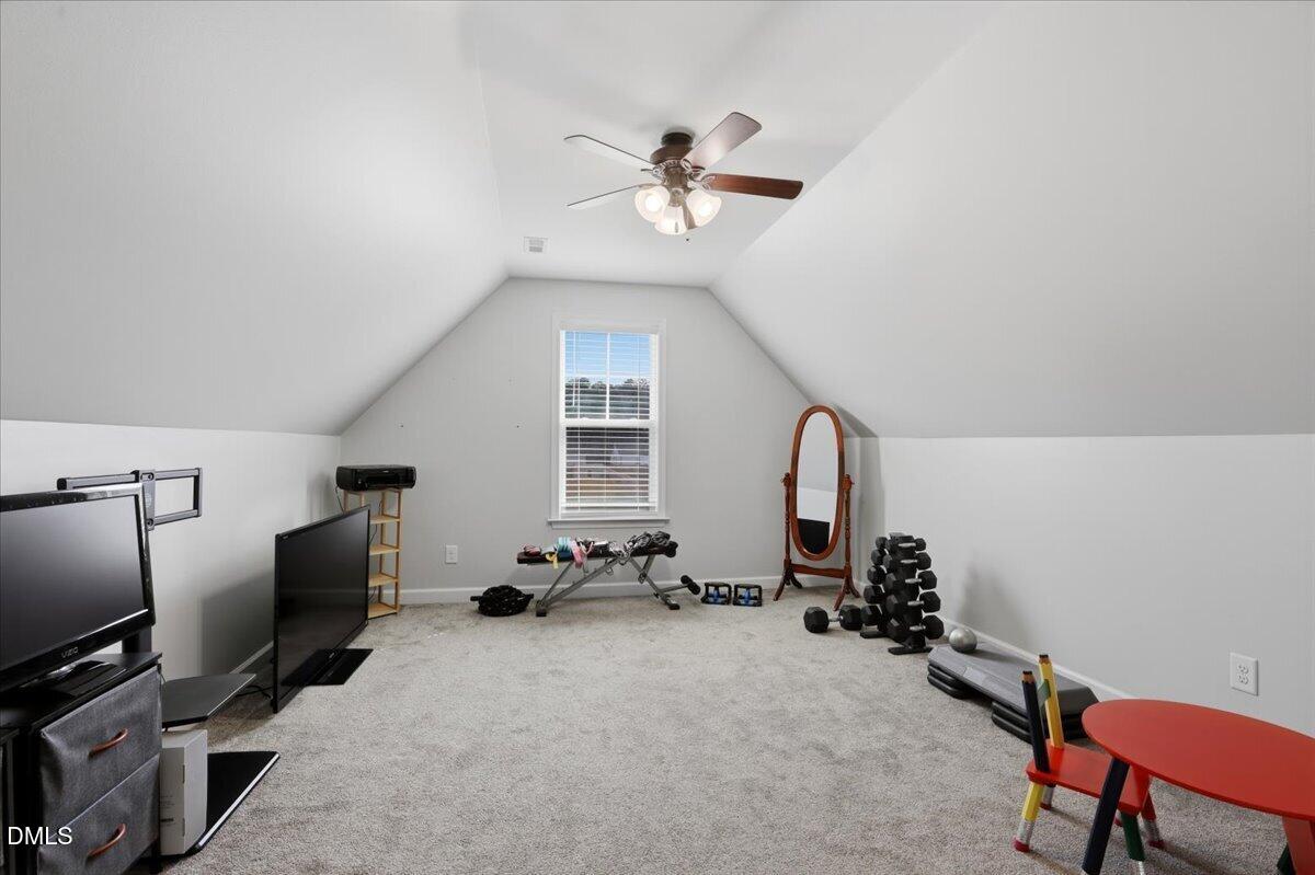 136 Fallingbrook Drive Kenly, NC 27542 - Photo 24 of 54 a view of a room with gym equipment