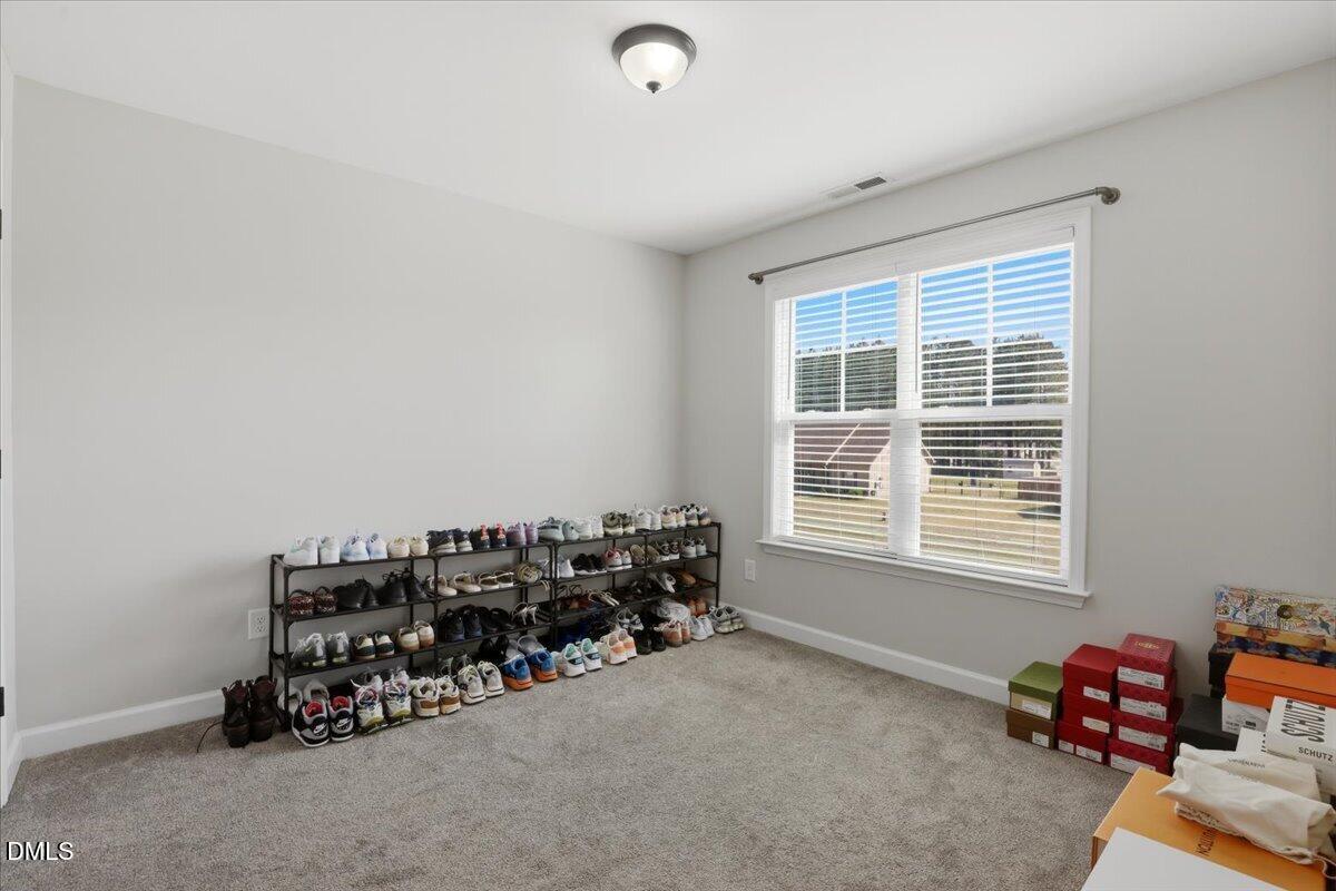 136 Fallingbrook Drive Kenly, NC 27542 - Photo 26 of 54 a room with toys and a chair