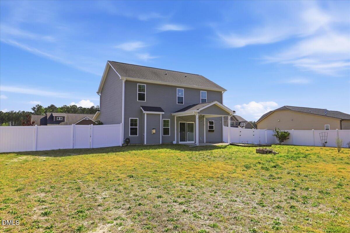 136 Fallingbrook Drive Kenly, NC 27542 - Photo 36 of 54 a view of a house with a yard