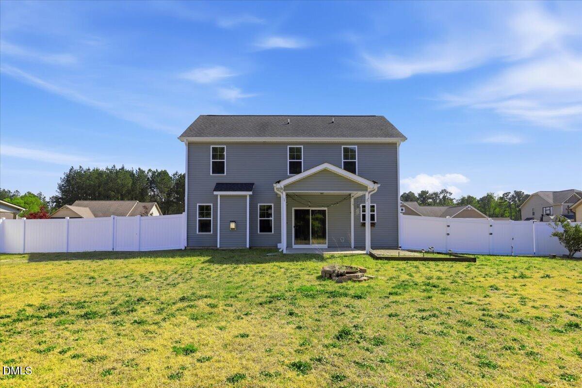 136 Fallingbrook Drive Kenly, NC 27542 - Photo 37 of 54 a front view of a house with a yard