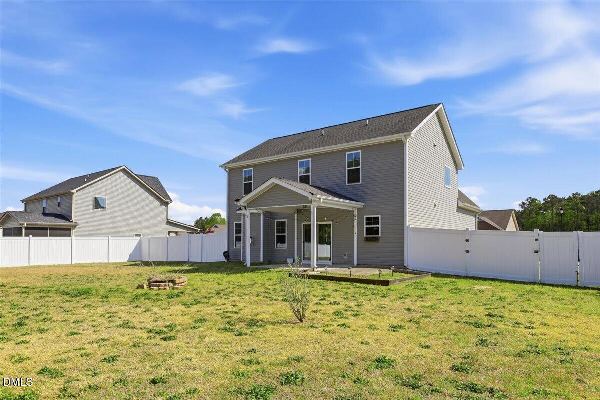 136 Fallingbrook Drive Kenly, NC 27542 - Photo 38 of 54 a front view of a house with a yard