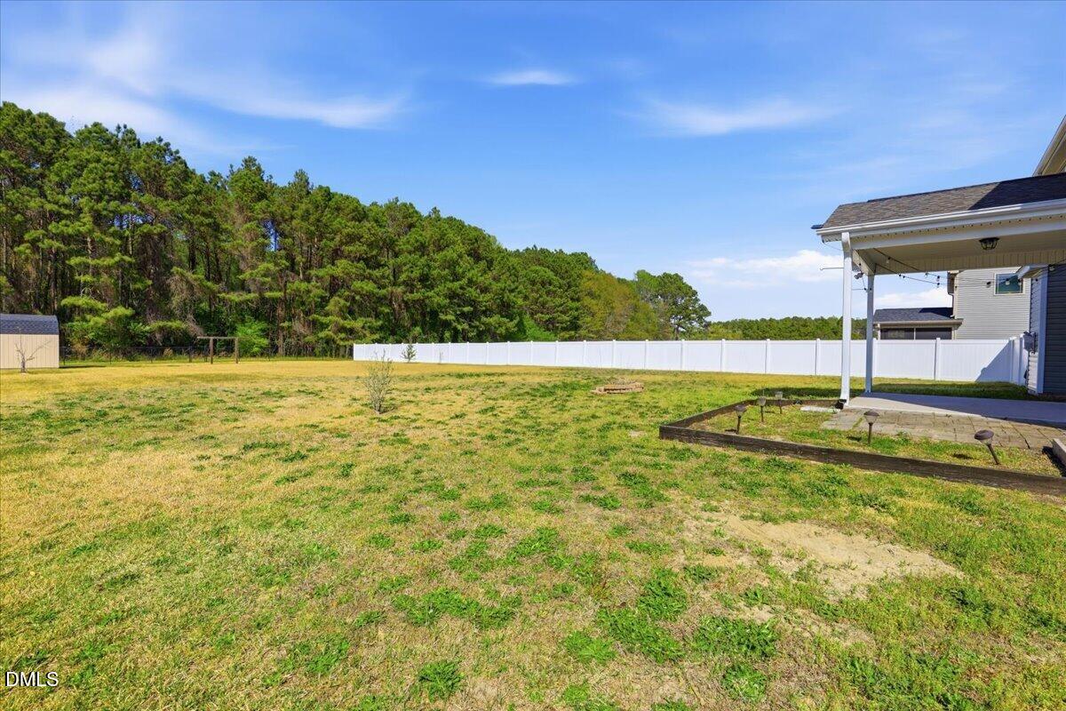 136 Fallingbrook Drive Kenly, NC 27542 - Photo 40 of 54 a view of a swimming pool with an ocean view