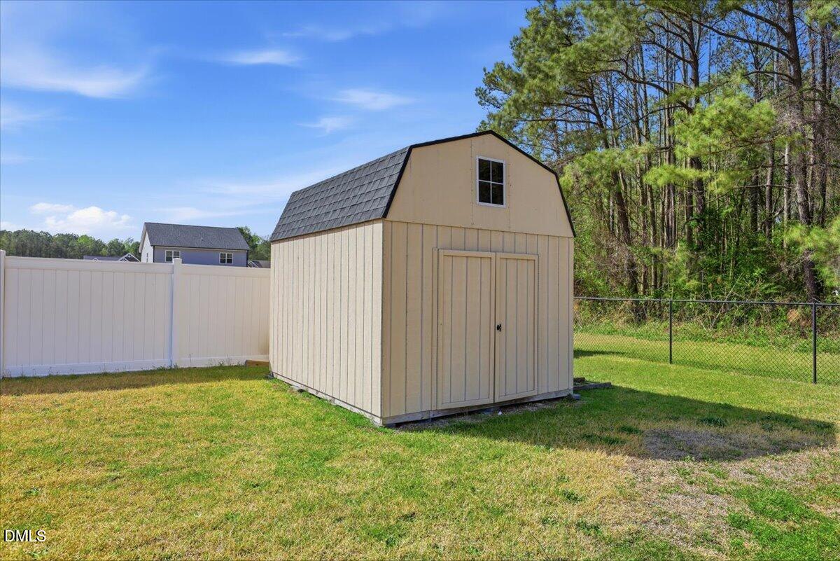 136 Fallingbrook Drive Kenly, NC 27542 - Photo 41 of 54 a house with a yard