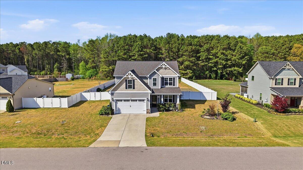 136 Fallingbrook Drive Kenly, NC 27542 - Photo 44 of 54 a view of a house with a swimming pool