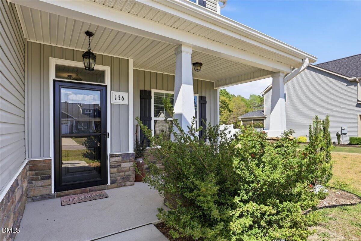 136 Fallingbrook Drive Kenly, NC 27542 - Photo 5 of 54 a front view of a house with a yard