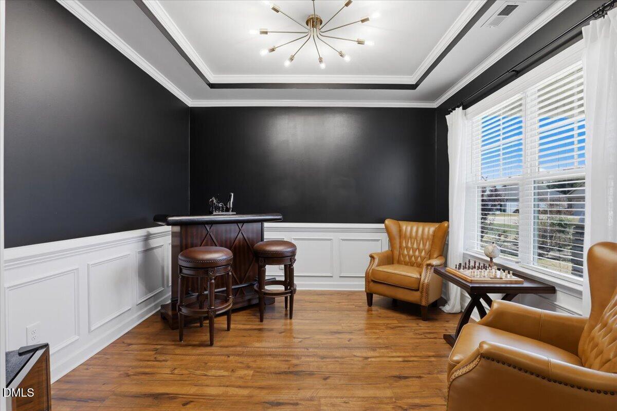 136 Fallingbrook Drive Kenly, NC 27542 - Photo 7 of 54 a living room with furniture and a wooden floor