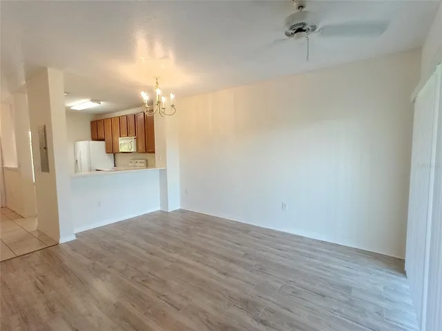 a view of a kitchen from the hallway