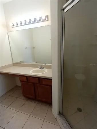 a view of bathroom with a sink and vanity