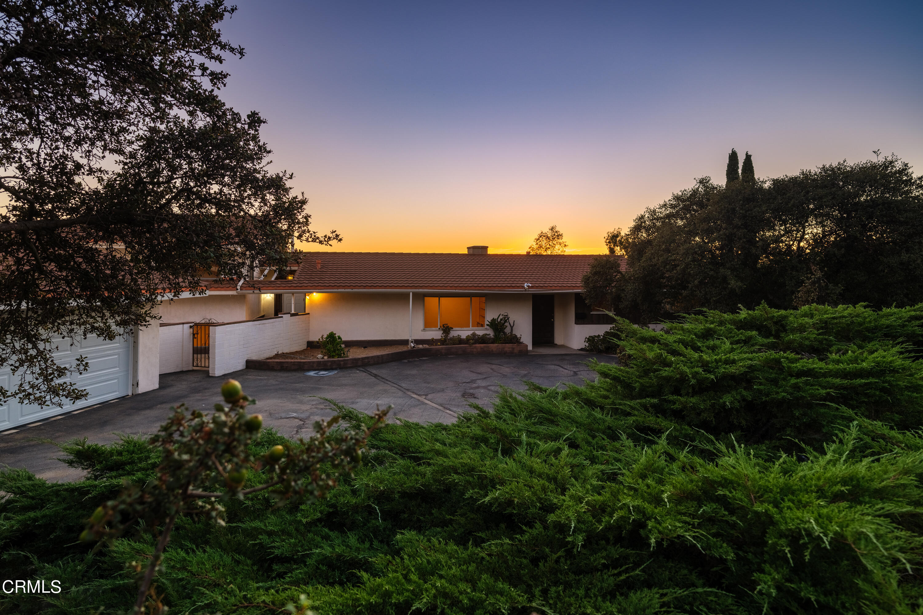 a house view with a garden space