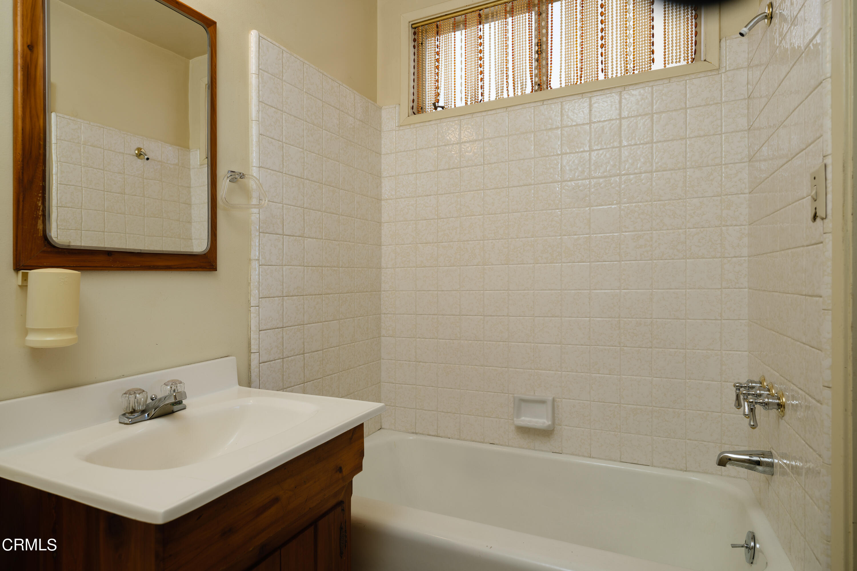 7162 Estepa Drive Tujunga, CA 91042 - Photo 23 of 43 a bathroom with a sink and a bathtub