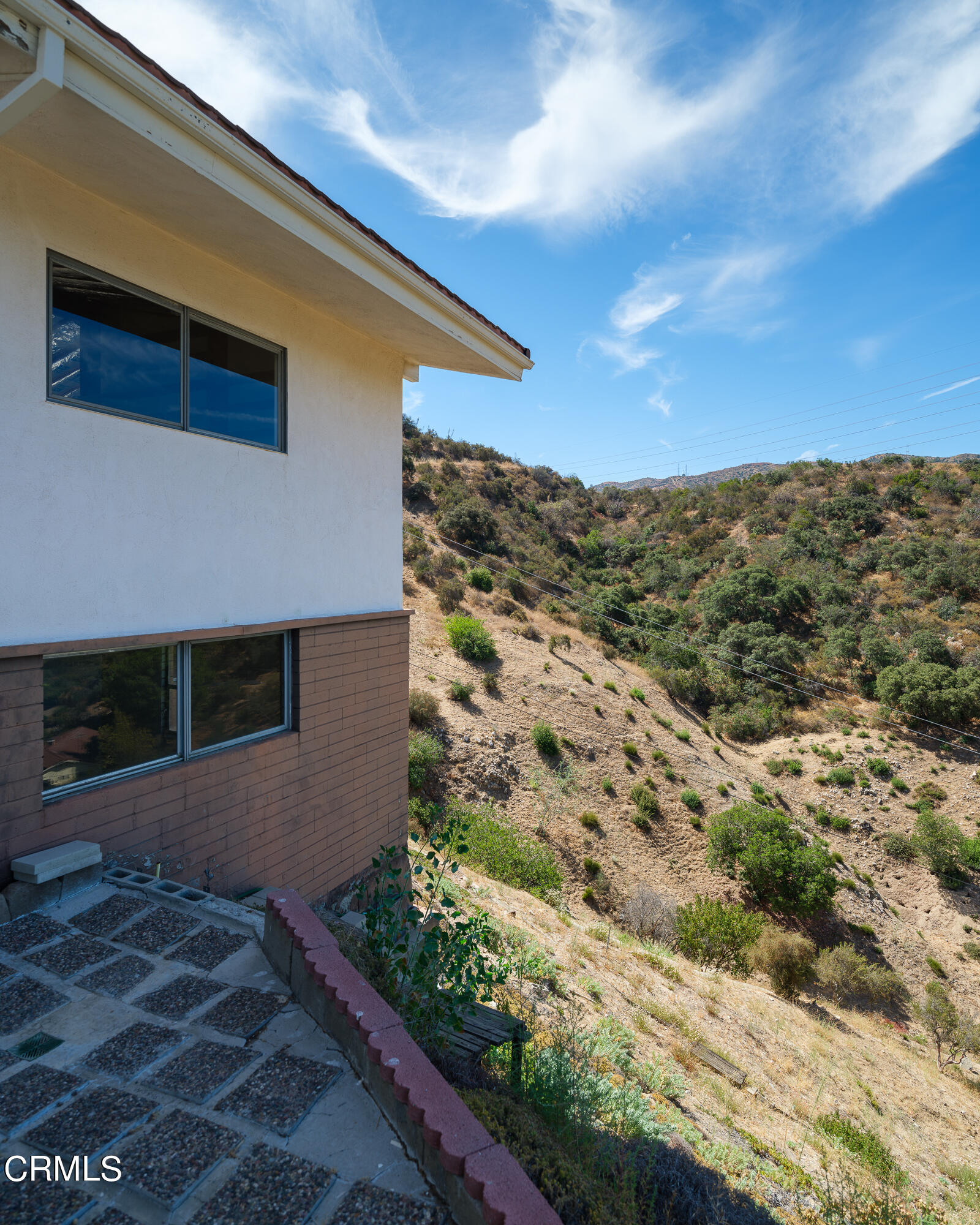 7162 Estepa Drive Tujunga, CA 91042 - Photo 29 of 43 a view of a house with a yard