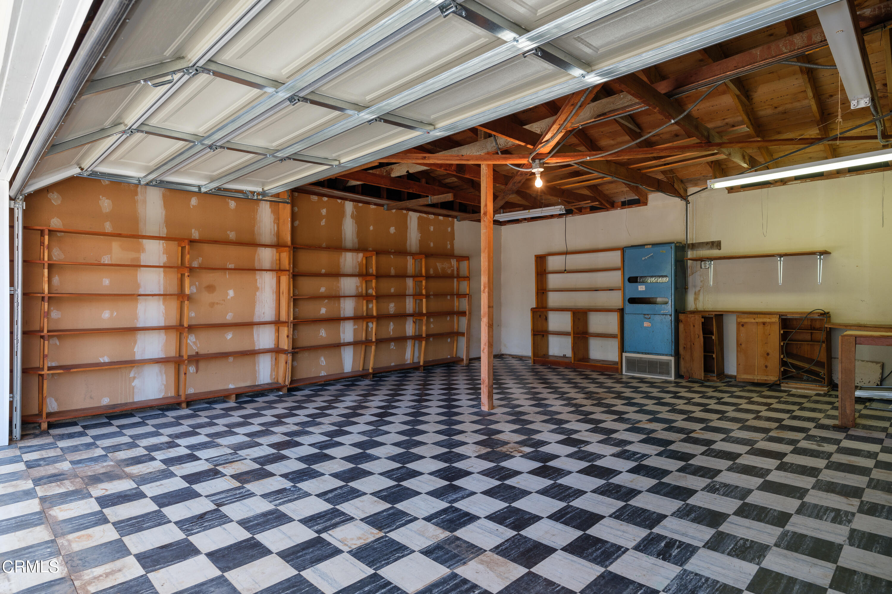 7162 Estepa Drive Tujunga, CA 91042 - Photo 35 of 43 a black and white building with a black white checkered floor