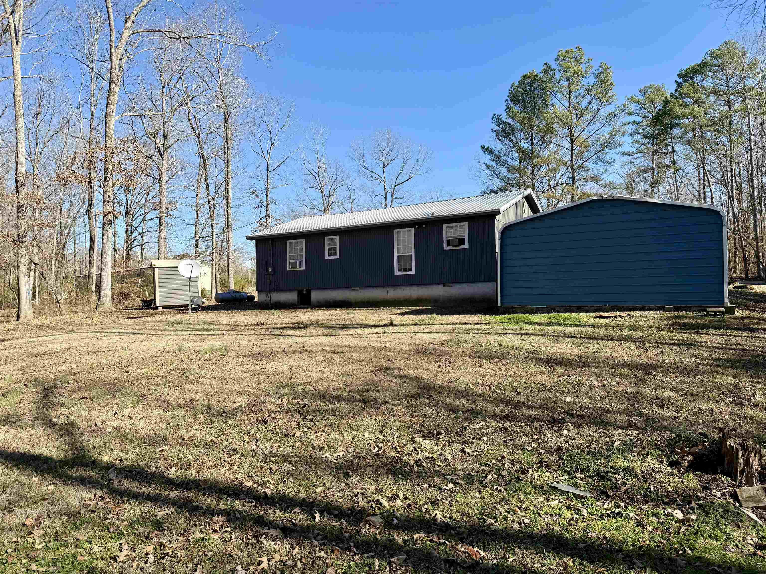 82 Shane Lane Ramer, TN 38367 - Photo 11 of 18 a view of a house with a yard