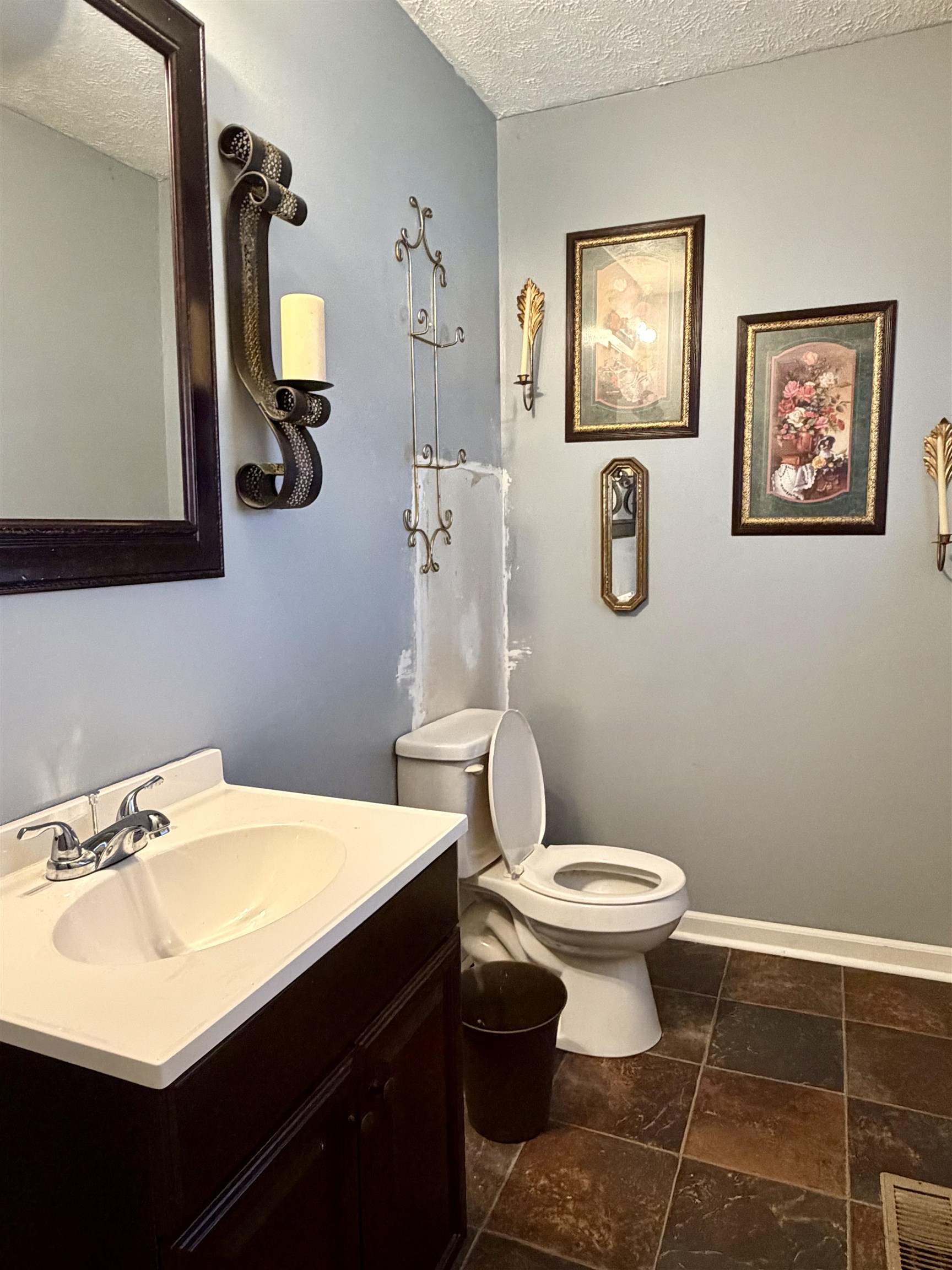 82 Shane Lane Ramer, TN 38367 - Photo 4 of 18 a bathroom with a sink mirror and toilet