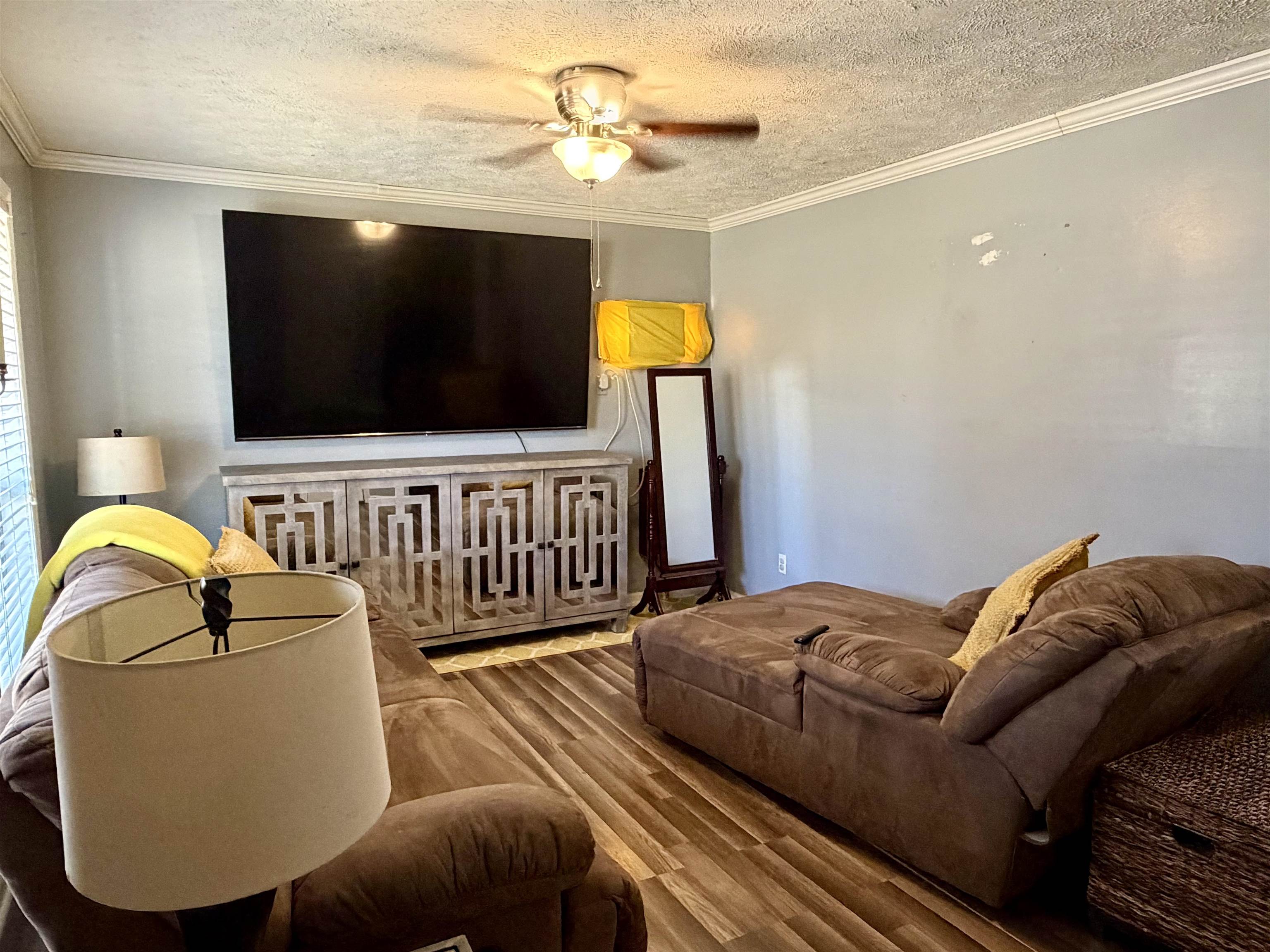 82 Shane Lane Ramer, TN 38367 - Photo 4 of 18 a living room with furniture and a flat screen tv