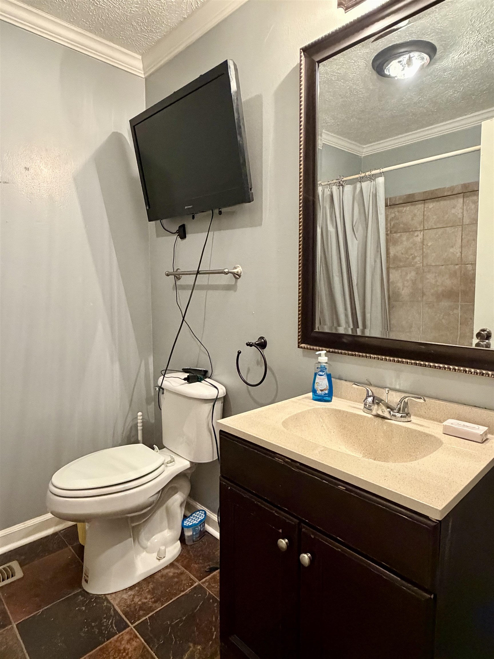82 Shane Lane Ramer, TN 38367 - Photo 7 of 18 a bathroom with a sink toilet and mirror