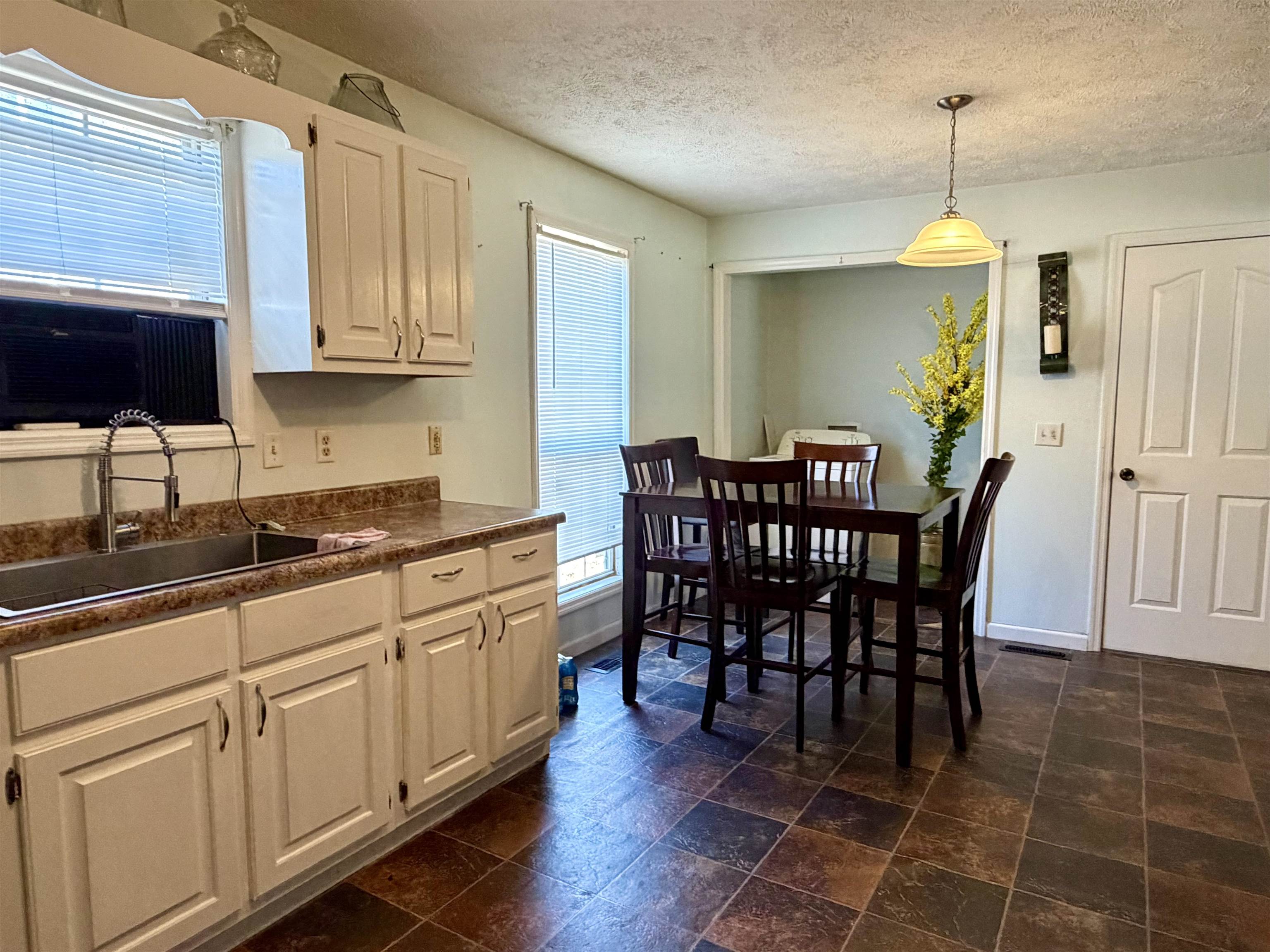 82 Shane Lane Ramer, TN 38367 - Photo 8 of 18 a view of a dining room with furniture window and wooden floor
