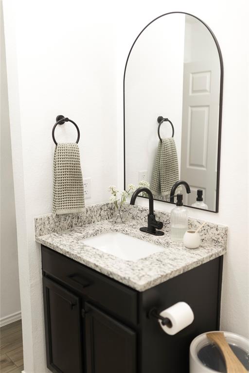 3224 Sherco Road Lorena, TX 76655 - Photo 18 of 20 a bathroom with a granite countertop sink and a mirror