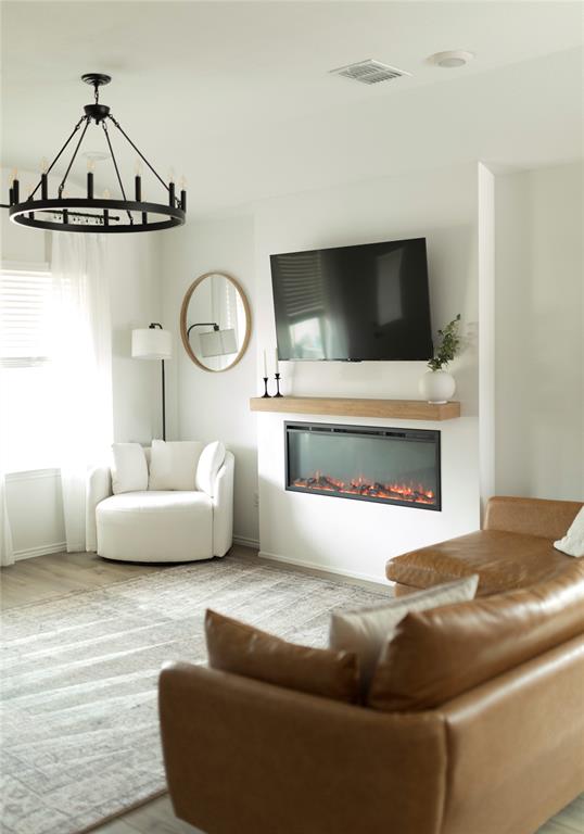 3224 Sherco Road Lorena, TX 76655 - Photo 5 of 20 a living room with furniture and a fireplace