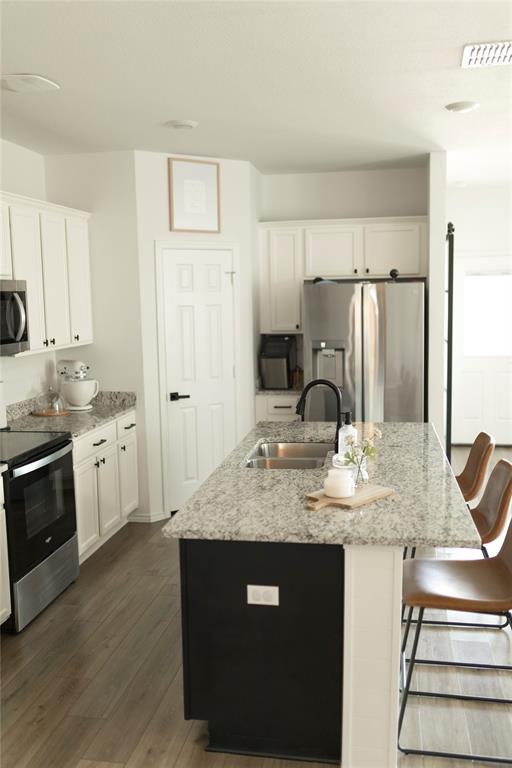 3224 Sherco Road Lorena, TX 76655 - Photo 8 of 20 a kitchen with sink a stove and refrigerator