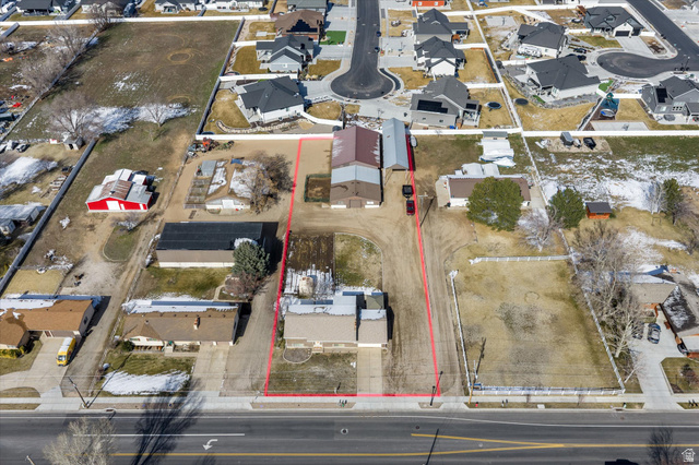 2298 West 800 North Clinton, UT 84015 - Photo 5 of 53 Aerial view of residential area featuring property boundaries highlighted