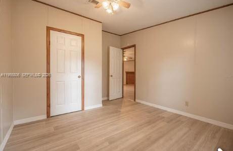 1604 Pineford Road Lakeland, FL 33809 - Photo 13 of 28 wooden floor in an empty room