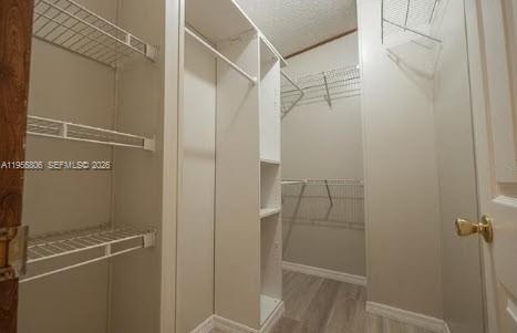 1604 Pineford Road Lakeland, FL 33809 - Photo 18 of 28 a bathroom with a glass shower door