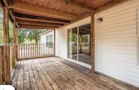 a view of backyard with green space
