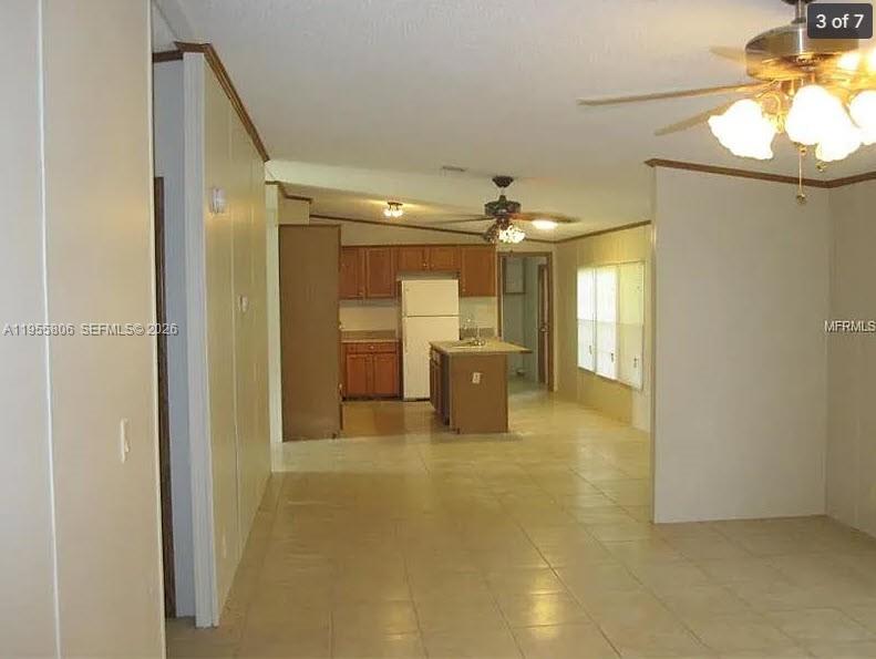 1604 Pineford Road Lakeland, FL 33809 - Photo 6 of 28 a view of a bathroom with a sink and a mirror
