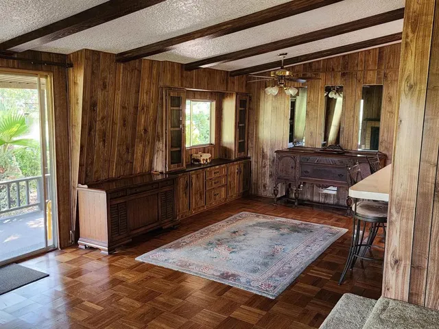 a kitchen with stainless steel appliances granite countertop a stove top oven a refrigerator a sink and dishwasher