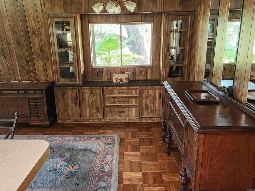 18218 Paradise Mountain Road Valley Center, CA 92082 - Photo 19 of 32 a kitchen with a sink and a stove next to a window