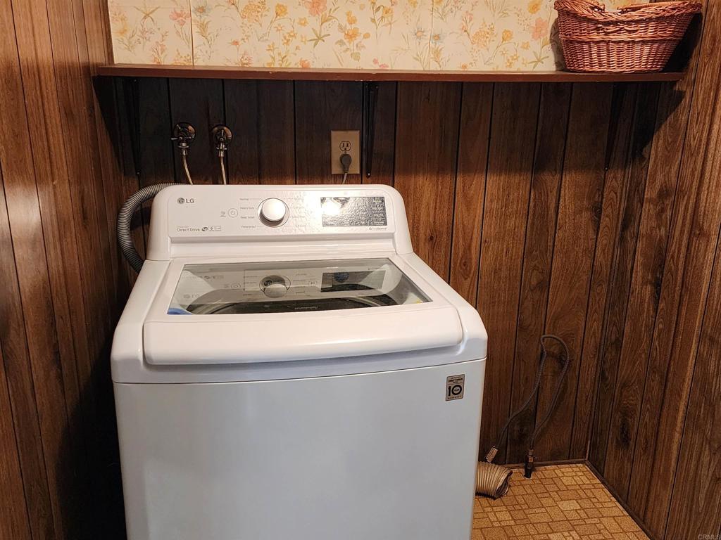 18218 Paradise Mountain Road Valley Center, CA 92082 - Photo 30 of 32 a utility room with dryer and washer