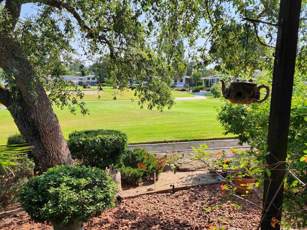 18218 Paradise Mountain Road Valley Center, CA 92082 - Photo 9 of 32 a view of a garden with an ocean