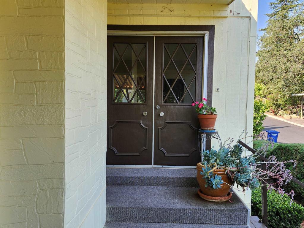18218 Paradise Mountain Road Valley Center, CA 92082 - Photo 10 of 32 a view of entrance door of the house