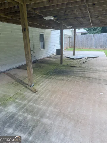 a view of a backyard of the house