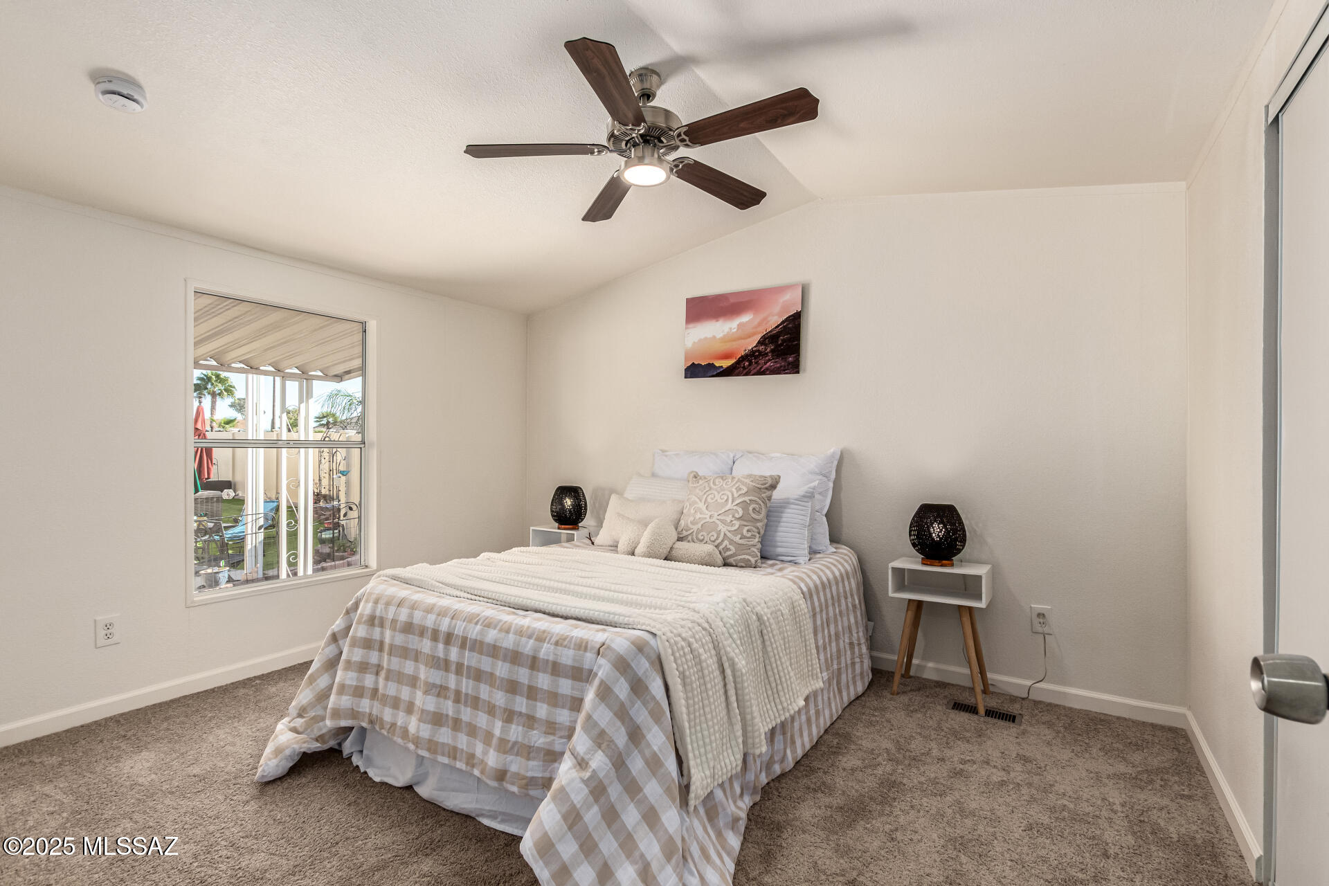 8401 South Kolb Road, Unit 94 Tucson, AZ 85756 - Photo 20 of 24 a bedroom with a bed and a window