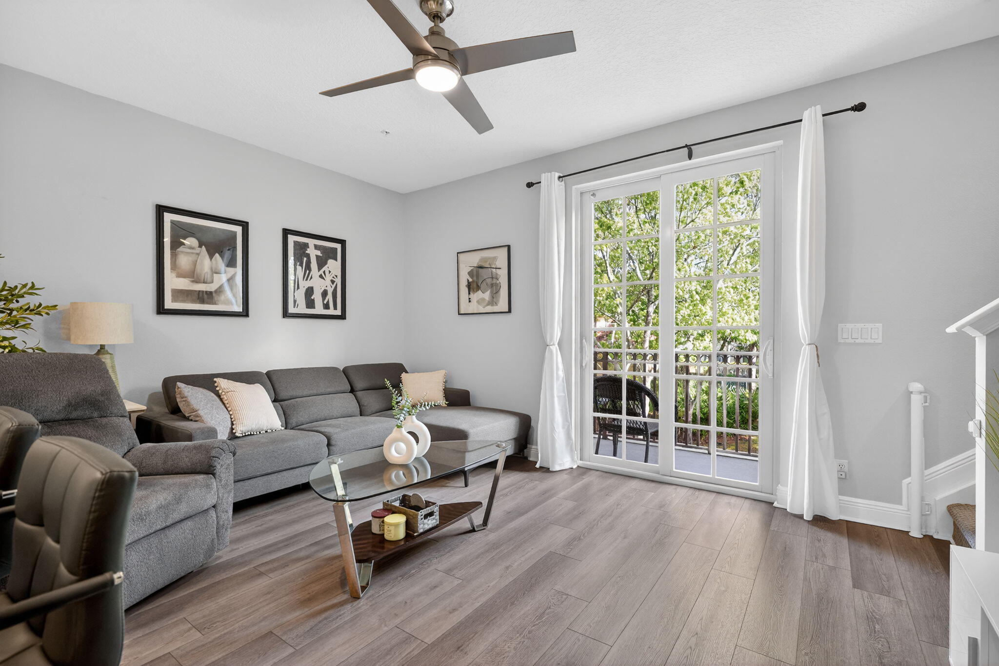 108 Morning Dew Circle Jupiter, FL 33458 - Photo 13 of 46 a living room with furniture and a large window