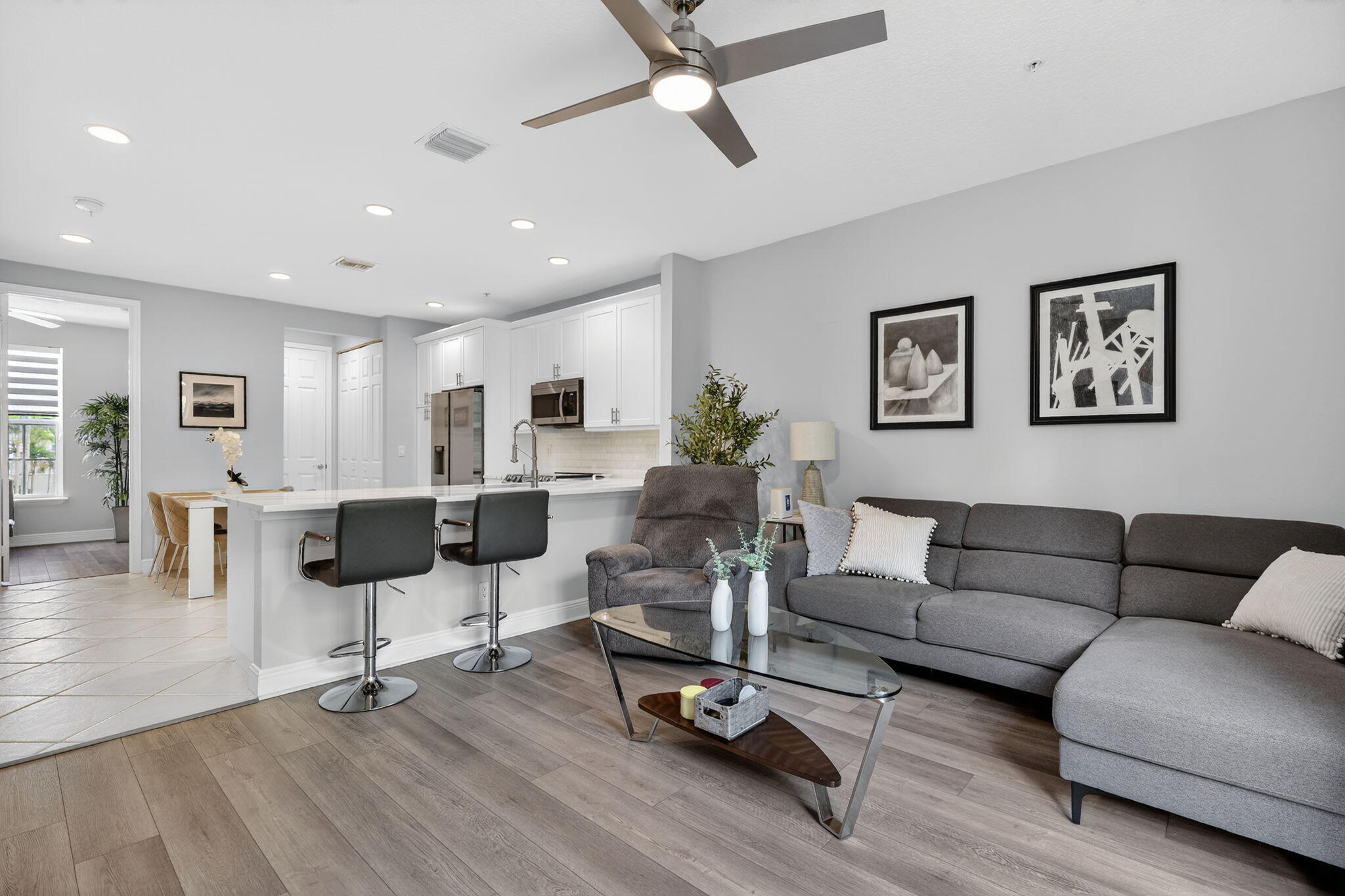108 Morning Dew Circle Jupiter, FL 33458 - Photo 14 of 46 a living room with furniture and wooden floor