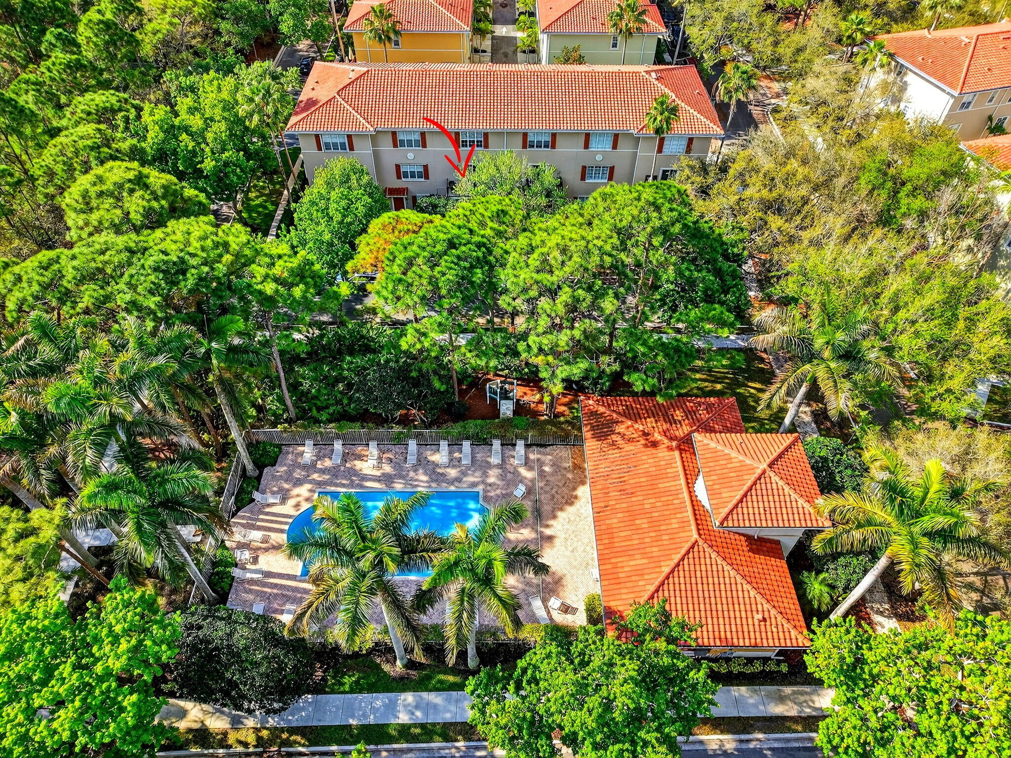 108 Morning Dew Circle Jupiter, FL 33458 - Photo 2 of 46 an aerial view of a house with a yard