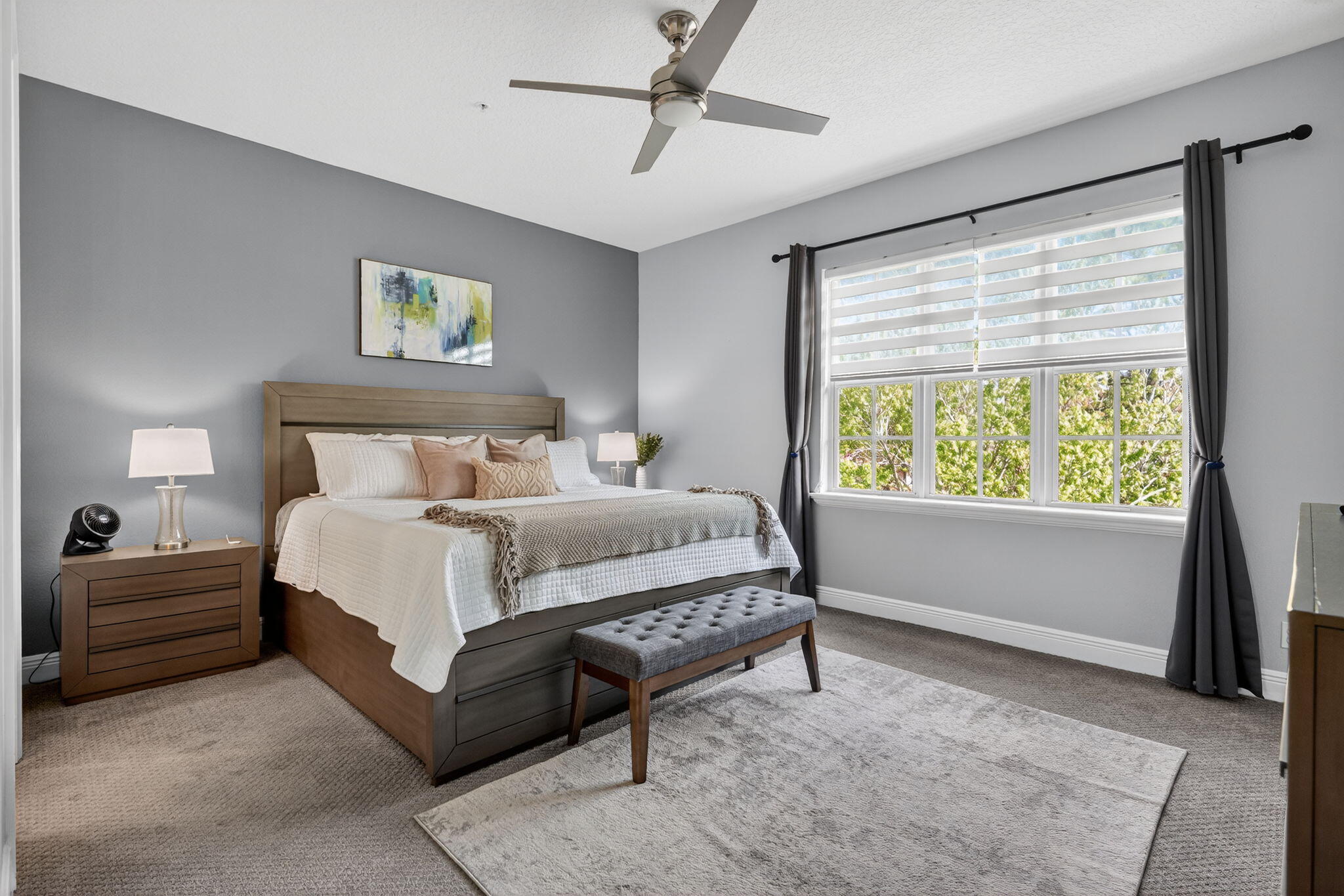 108 Morning Dew Circle Jupiter, FL 33458 - Photo 22 of 46 a bedroom with a bed and a window