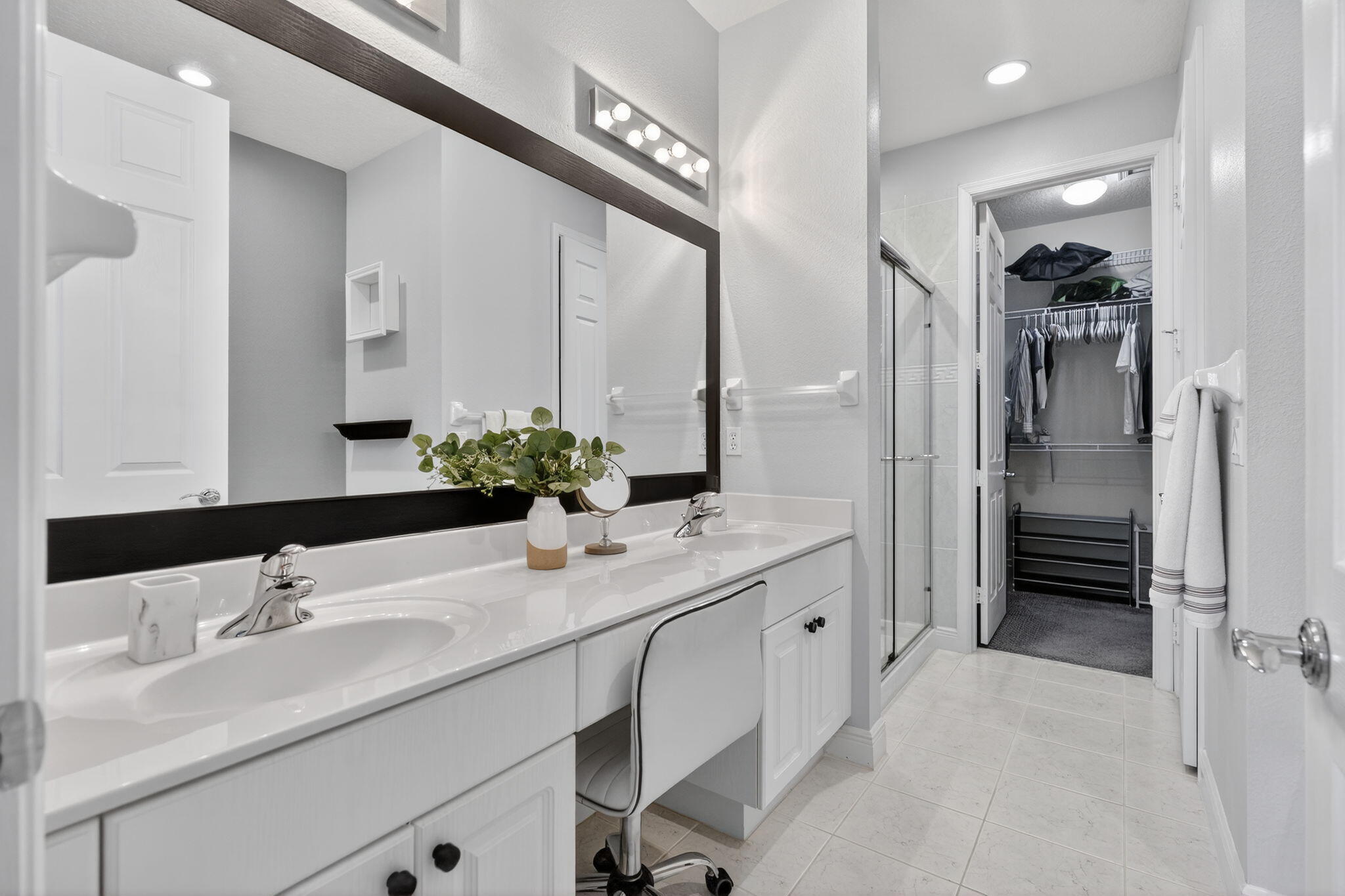 108 Morning Dew Circle Jupiter, FL 33458 - Photo 24 of 46 a bathroom with a sink double vanity and a mirror