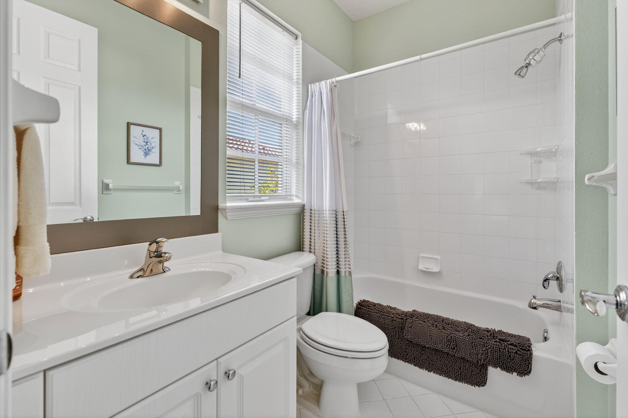 108 Morning Dew Circle Jupiter, FL 33458 - Photo 30 of 46 a bathroom with a sink toilet and shower